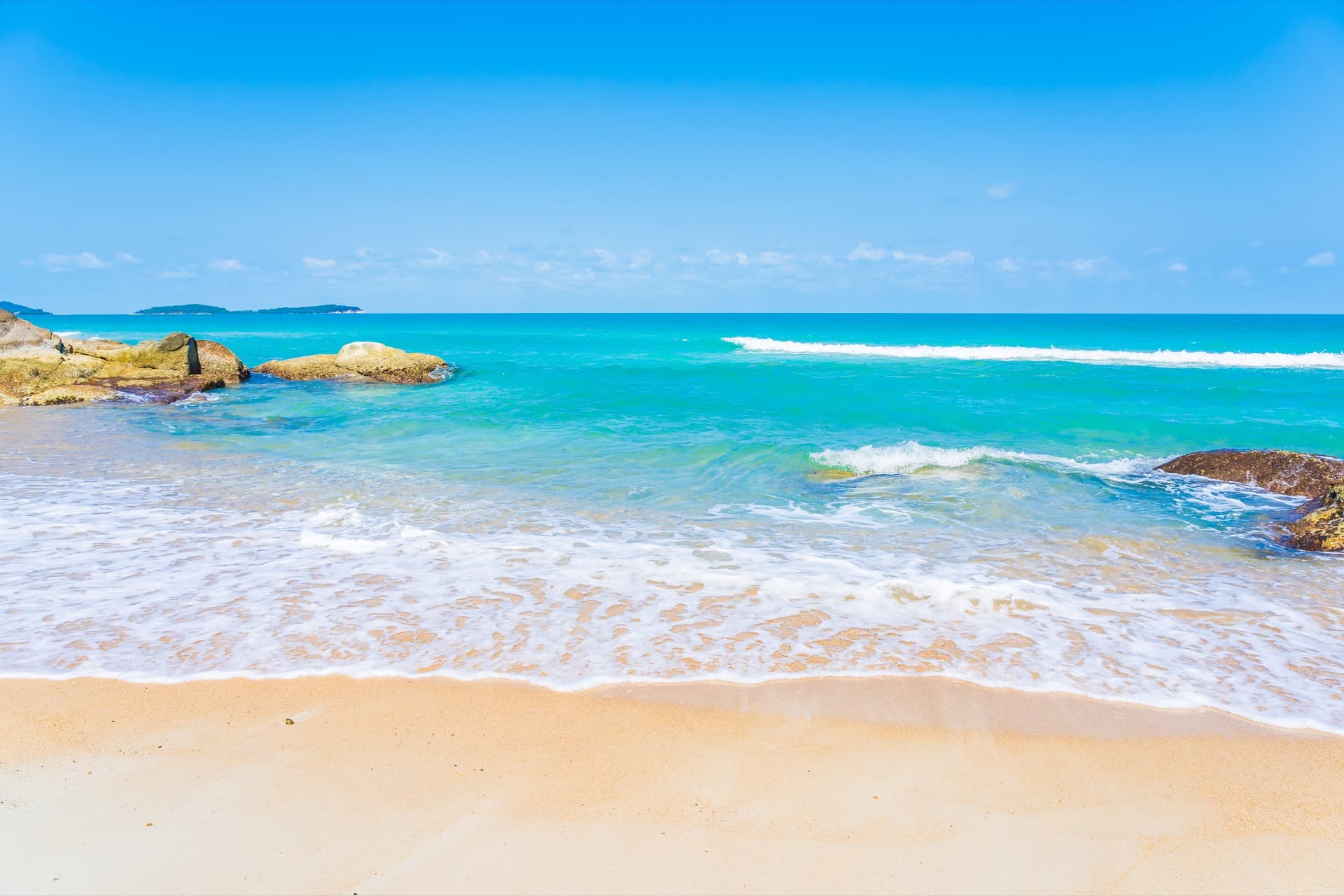 beautiful-tropical-beach-sea-ocean-with-white-cloud-blue-sky-background-travel-vacation-trip-web